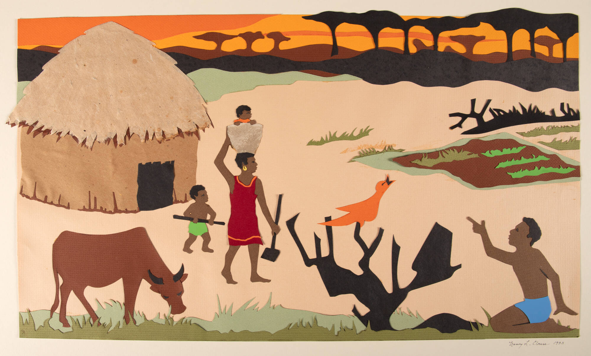 Image made from torn paper of an African village scene that includes people, a hut, a cow, and a tree.